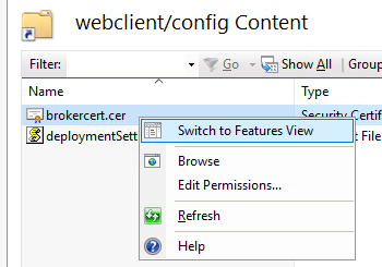Screenshot showing IIS, with focus on brokercert.cer, it's context menu, and the "Switch to Features View" option
